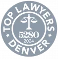 Seal showing Top Lawyers Denver 2024 with scales of justice and 5280 in center.