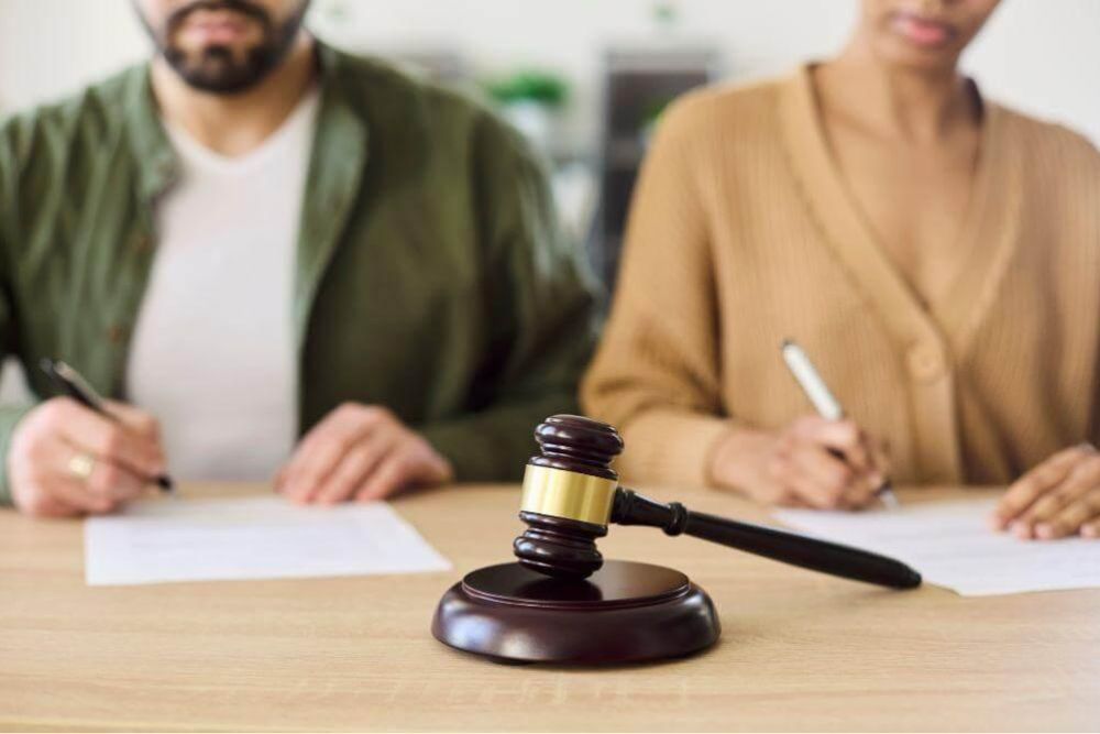 Judge and woman reviewing a common law marriage case at