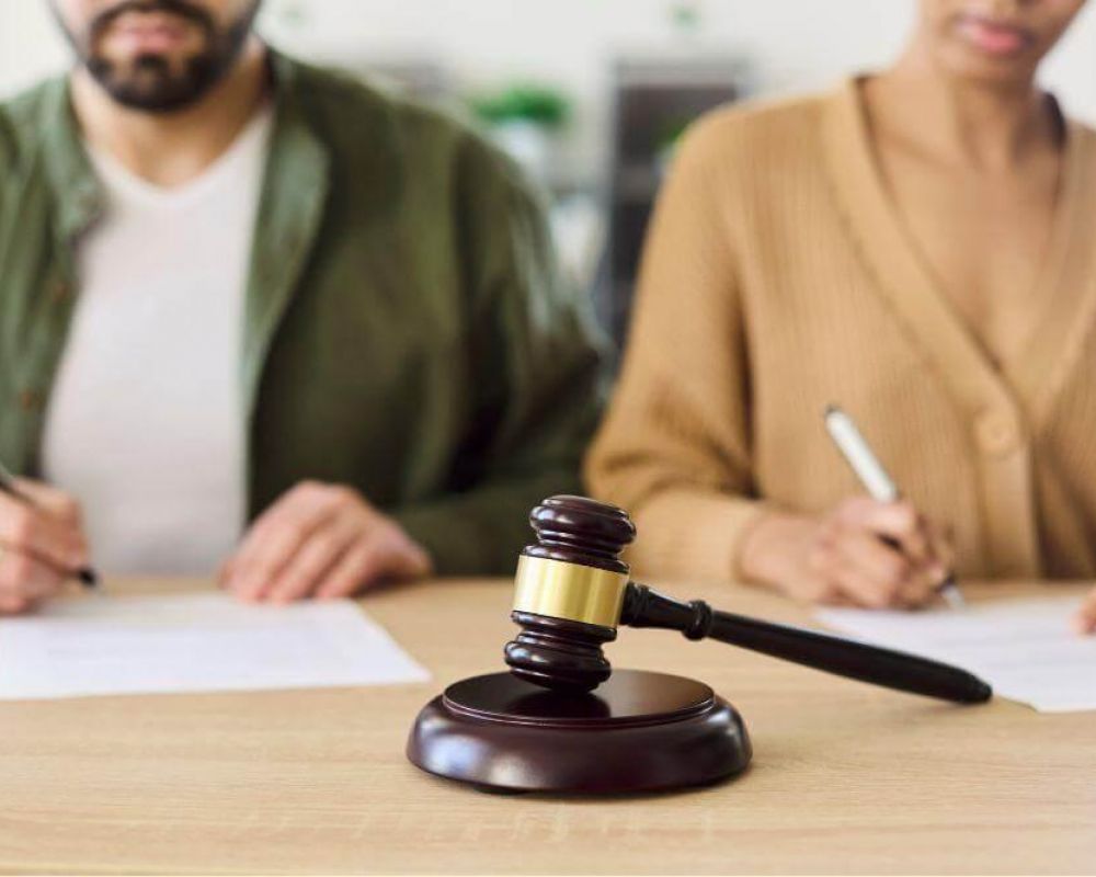 Judge and woman reviewing a common law marriage case at