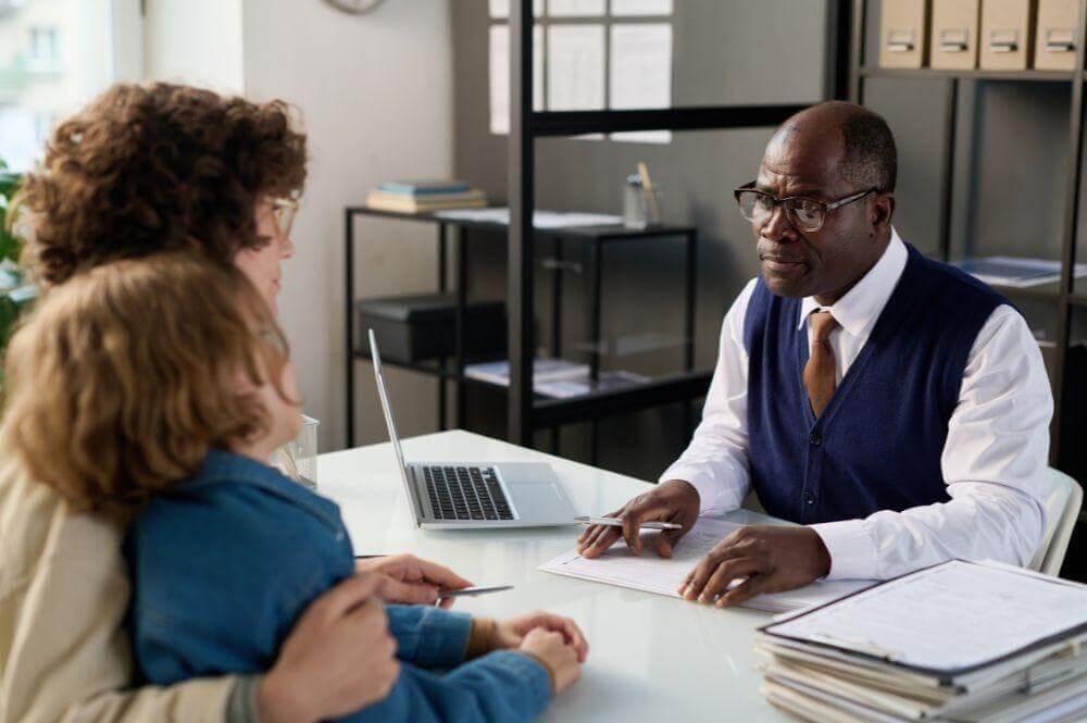 Man and woman discussing common law marriage with adviser